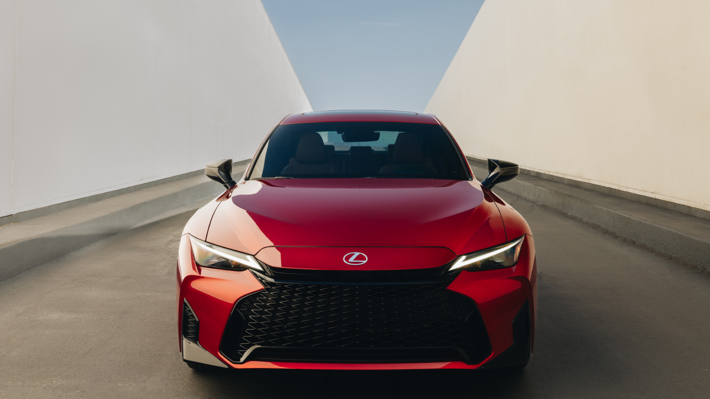 IS shown in Infrared exterior color with F SPORT front grille.