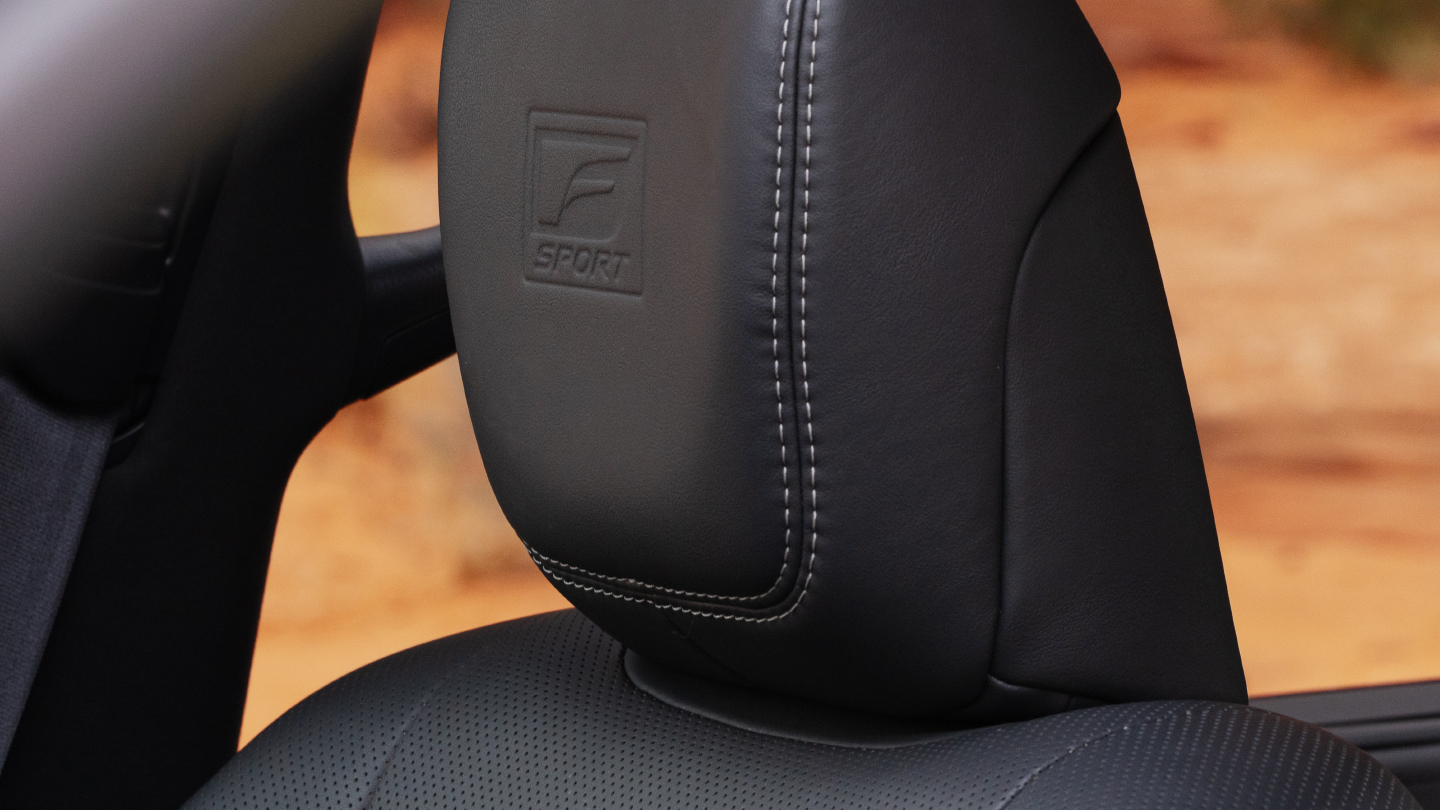 Close-up of embossed headrest in LX F SPORT.